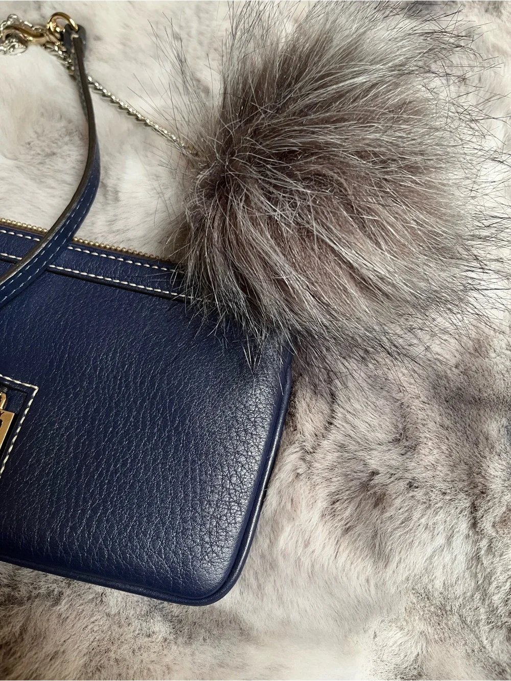 Dooney & Bourke Navy Pebbled Leather Wristlet with Fur Pom